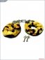 Металлические наручники с пятнистым мехом "под леопарда"